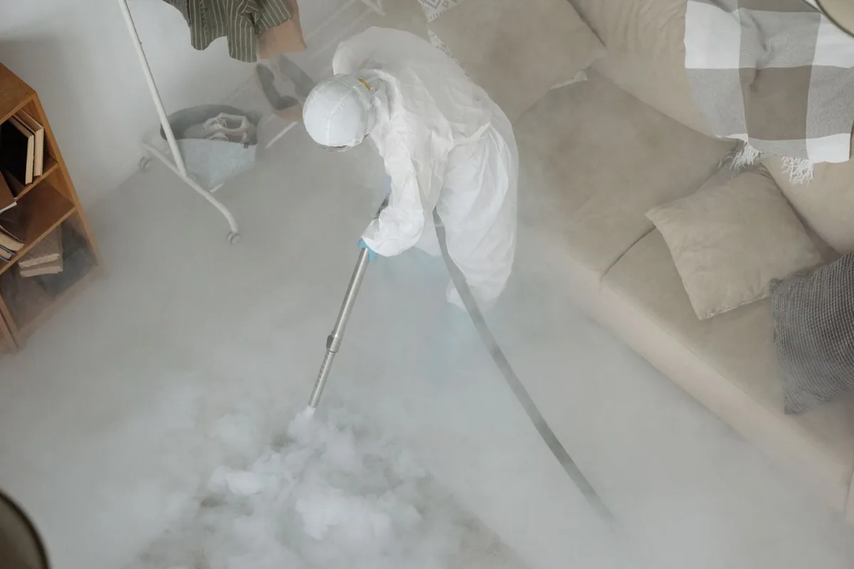 Biohazard cleanup technician in protective equipment, Emerald Lakes, PA